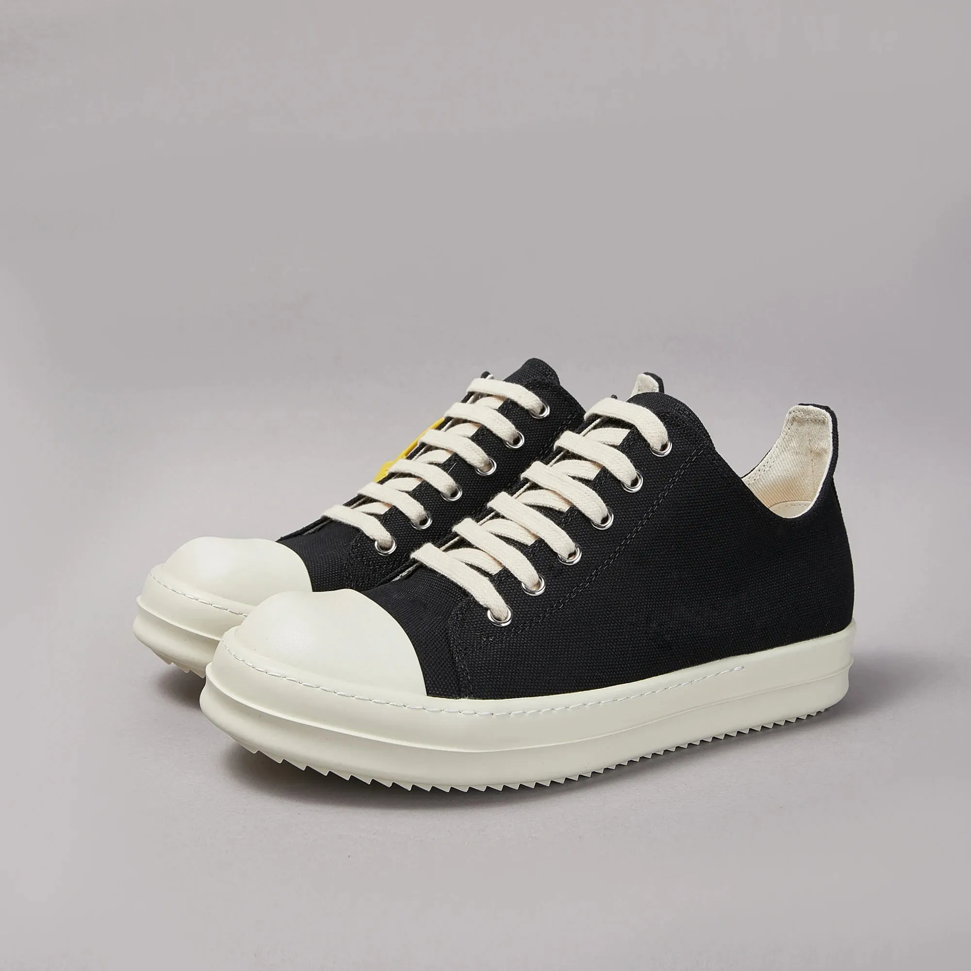 Low top canvas lace up sneakers