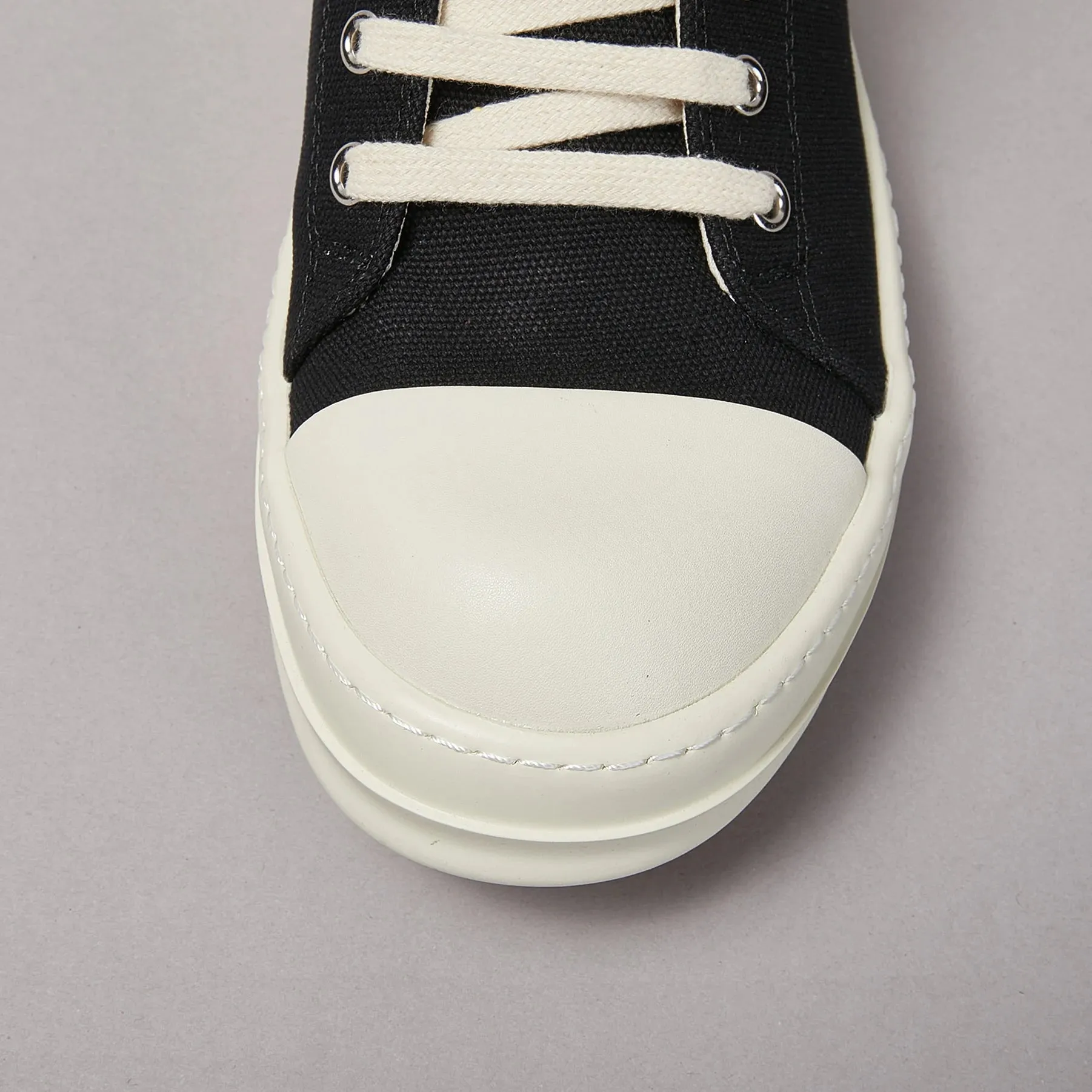 Low top canvas lace up sneakers